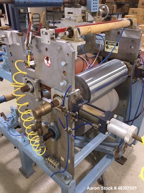 Used Lyons Pilot Coater/Laminator. 15" max coating width, 6" min. 30' oven, 304 SS, two zone, natural gas fired, 18" wide idler rolls. Nip fed three roll reverse roll coating station. Knife over roll...