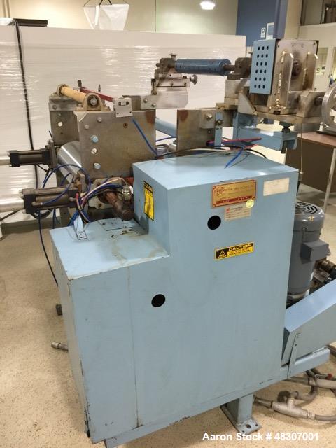 Used Lyons Pilot Coater/Laminator. 15" max coating width, 6" min. 30' oven, 304 SS, two zone, natural gas fired, 18" wide idler rolls. Nip fed three roll reverse roll coating station. Knife over roll...
