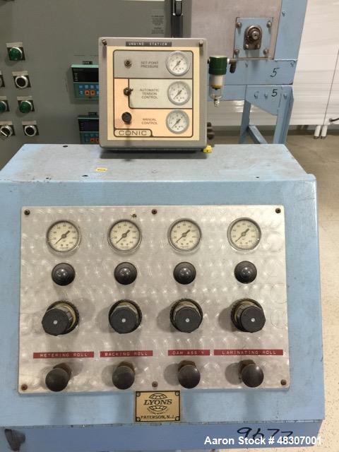 Used Lyons Pilot Coater/Laminator. 15" max coating width, 6" min. 30' oven, 304 SS, two zone, natural gas fired, 18" wide idler rolls. Nip fed three roll reverse roll coating station. Knife over roll...