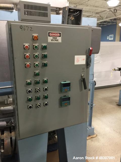Used Lyons Pilot Coater/Laminator. 15" max coating width, 6" min. 30' oven, 304 SS, two zone, natural gas fired, 18" wide idler rolls. Nip fed three roll reverse roll coating station. Knife over roll...