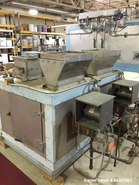 Used Lyons Pilot Coater/Laminator. 15" max coating width, 6" min. 30' oven, 304 SS, two zone, natural gas fired, 18" wide idler rolls. Nip fed three roll reverse roll coating station. Knife over roll...