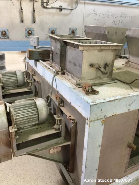 Used Lyons Pilot Coater/Laminator. 15" max coating width, 6" min. 30' oven, 304 SS, two zone, natural gas fired, 18" wide idler rolls. Nip fed three roll reverse roll coating station. Knife over roll...