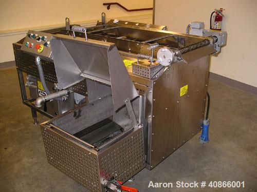 Used Complete Belshaw Century 200 Donut System, 153 dozen donuts per hour. Includes the following equipment:  Century fryer, model C200RH; Multi-Matic cutter with mobile lift carrier, model MDDRF4; C...