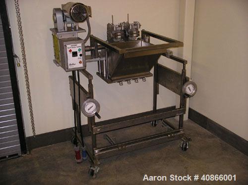 Used Complete Belshaw Century 200 Donut System, 153 dozen donuts per hour. Includes the following equipment:  Century fryer, model C200RH; Multi-Matic cutter with mobile lift carrier, model MDDRF4; C...