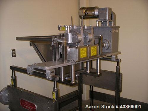 Used Complete Belshaw Century 200 Donut System, 153 dozen donuts per hour. Includes the following equipment:  Century fryer, model C200RH; Multi-Matic cutter with mobile lift carrier, model MDDRF4; C...