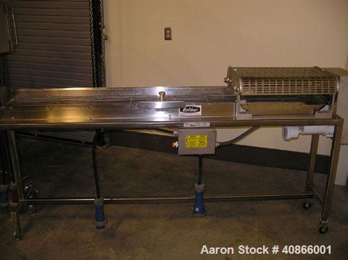 Used Complete Belshaw Century 200 Donut System, 153 dozen donuts per hour. Includes the following equipment:  Century fryer, model C200RH; Multi-Matic cutter with mobile lift carrier, model MDDRF4; C...