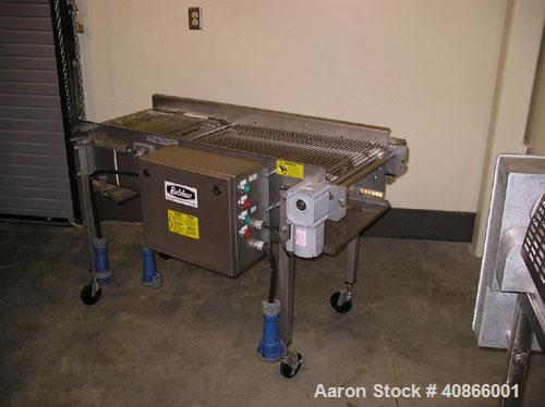 Used Complete Belshaw Century 200 Donut System, 153 dozen donuts per hour. Includes the following equipment:  Century fryer, model C200RH; Multi-Matic cutter with mobile lift carrier, model MDDRF4; C...
