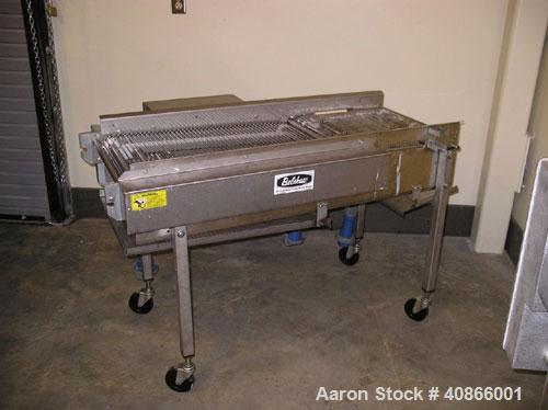 Used Complete Belshaw Century 200 Donut System, 153 dozen donuts per hour. Includes the following equipment:  Century fryer, model C200RH; Multi-Matic cutter with mobile lift carrier, model MDDRF4; C...