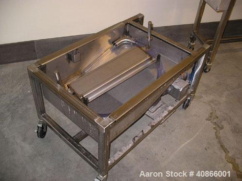 Used Complete Belshaw Century 200 Donut System, 153 dozen donuts per hour. Includes the following equipment:  Century fryer, model C200RH; Multi-Matic cutter with mobile lift carrier, model MDDRF4; C...