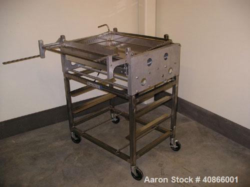 Used Complete Belshaw Century 200 Donut System, 153 dozen donuts per hour. Includes the following equipment:  Century fryer, model C200RH; Multi-Matic cutter with mobile lift carrier, model MDDRF4; C...