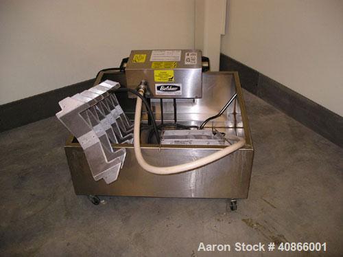 Used Complete Belshaw Century 200 Donut System, 153 dozen donuts per hour. Includes the following equipment:  Century fryer, model C200RH; Multi-Matic cutter with mobile lift carrier, model MDDRF4; C...