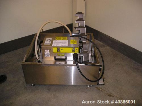 Used Complete Belshaw Century 200 Donut System, 153 dozen donuts per hour. Includes the following equipment:  Century fryer, model C200RH; Multi-Matic cutter with mobile lift carrier, model MDDRF4; C...