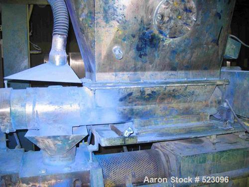 USED: Comac extrusion line. (1) Feeding system Matcon or Anag containers, servo lift Matcon (hydraulic lifting and positioning system), with 55 gallon (210 liter) Matcon buffer, screw feeder. (1) Com...