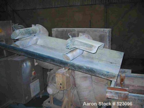 USED: Comac extrusion line. (1) Feeding system Matcon or Anag containers, servo lift Matcon (hydraulic lifting and positioning system), with 55 gallon (210 liter) Matcon buffer, screw feeder. (1) Com...