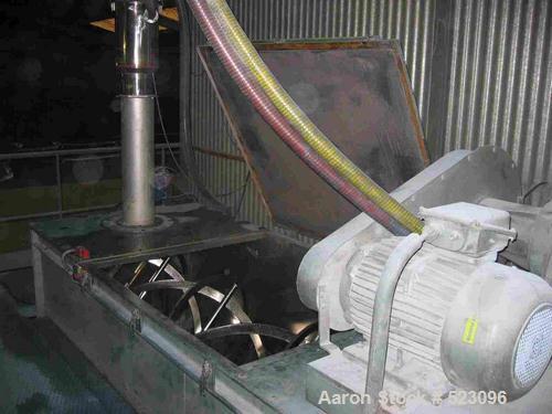 USED: Comac extrusion line. (1) Feeding system Matcon or Anag containers, servo lift Matcon (hydraulic lifting and positioning system), with 55 gallon (210 liter) Matcon buffer, screw feeder. (1) Com...