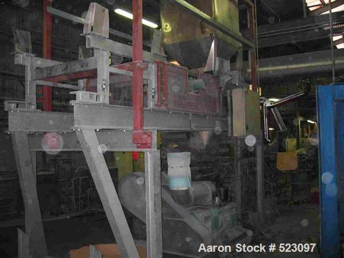 USED: Comac extrusion line. (1) Feeding system Matcon or Anag containers, servo lift Matcon (hydraulic lifting and positioning system), with 55 gallon (210 liter) Matcon buffer, screw feeder. (1) Com...