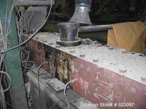 USED: Comac extrusion line. (1) Feeding system Matcon or Anag containers, servo lift Matcon (hydraulic lifting and positioning system), with 55 gallon (210 liter) Matcon buffer, screw feeder. (1) Com...