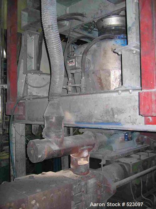 USED: Comac extrusion line. (1) Feeding system Matcon or Anag containers, servo lift Matcon (hydraulic lifting and positioning system), with 55 gallon (210 liter) Matcon buffer, screw feeder. (1) Com...