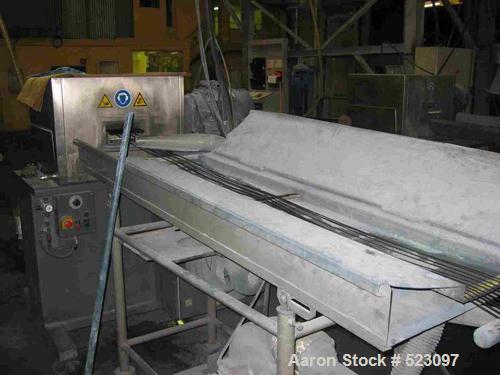 USED: Comac extrusion line. (1) Feeding system Matcon or Anag containers, servo lift Matcon (hydraulic lifting and positioning system), with 55 gallon (210 liter) Matcon buffer, screw feeder. (1) Com...