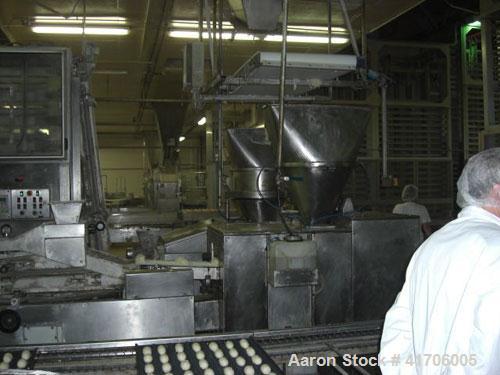 Used Mecatherm Baguette Line, output capacity 24,000 baguettes.Comprised of: (2) Mecatherm 2500 baguette lines dough divider, master roll, partial device for rolls, metal sheets transportation.(1) Cu...