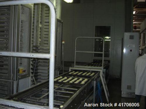 Used Mecatherm Baguette Line, output capacity 24,000 baguettes.Comprised of: (2) Mecatherm 2500 baguette lines dough divider, master roll, partial device for rolls, metal sheets transportation.(1) Cu...