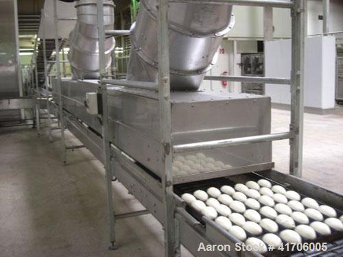 Used Mecatherm Baguette Line, output capacity 24,000 baguettes.Comprised of: (2) Mecatherm 2500 baguette lines dough divider, master roll, partial device for rolls, metal sheets transportation.(1) Cu...