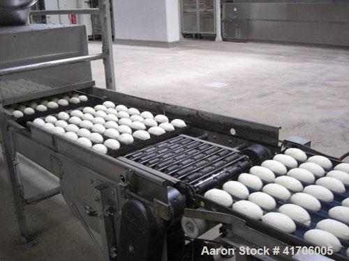 Used Mecatherm Baguette Line, output capacity 24,000 baguettes.Comprised of: (2) Mecatherm 2500 baguette lines dough divider, master roll, partial device for rolls, metal sheets transportation.(1) Cu...