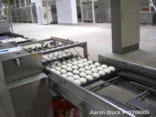 Used Mecatherm Baguette Line, output capacity 24,000 baguettes.Comprised of: (2) Mecatherm 2500 baguette lines dough divider, master roll, partial device for rolls, metal sheets transportation.(1) Cu...