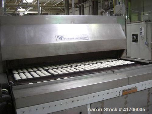 Used Mecatherm Baguette Line, output capacity 24,000 baguettes.Comprised of: (2) Mecatherm 2500 baguette lines dough divider, master roll, partial device for rolls, metal sheets transportation.(1) Cu...