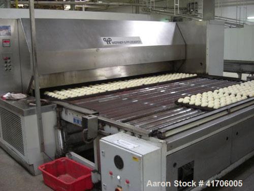 Used Mecatherm Baguette Line, output capacity 24,000 baguettes.Comprised of: (2) Mecatherm 2500 baguette lines dough divider, master roll, partial device for rolls, metal sheets transportation.(1) Cu...