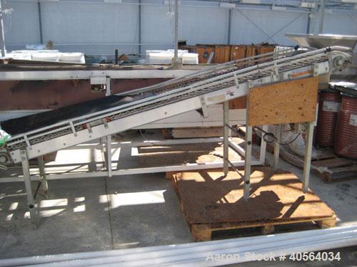 Used Vegetable Grading System, reportedly last used on tomatoes. Consists of 32 in wide grading belts, one 20 ft long, one 16 ft long, each with 3 side discharge belts. Also includes Cap Way inclined...