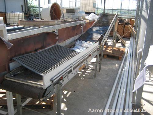 Used Vegetable Grading System, reportedly last used on tomatoes. Consists of 32 in wide grading belts, one 20 ft long, one 16 ft long, each with 3 side discharge belts. Also includes Cap Way inclined...