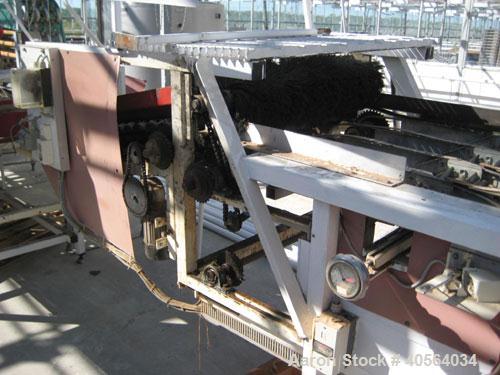 Used Vegetable Grading System, reportedly last used on tomatoes. Consists of 32 in wide grading belts, one 20 ft long, one 16 ft long, each with 3 side discharge belts. Also includes Cap Way inclined...