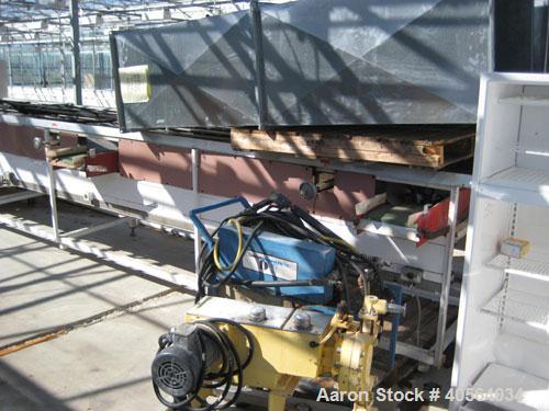 Used Vegetable Grading System, reportedly last used on tomatoes. Consists of 32 in wide grading belts, one 20 ft long, one 16 ft long, each with 3 side discharge belts. Also includes Cap Way inclined...