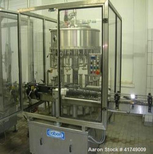 Used Wine Bottling Line, output 3000 bottles / hour, sizes 8 - 33 ounces (0.25 - 1 liter).  Comprised of:  (3) Forms 0.75 liter Bordeaux, 0.25 liter Bocksbeutel, 0.75 liter Bocksbeutel.  (1) Depallet...