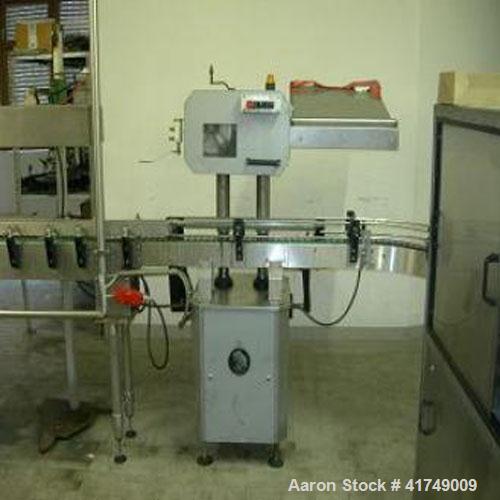 Used Wine Bottling Line, output 3000 bottles / hour, sizes 8 - 33 ounces (0.25 - 1 liter).  Comprised of:  (3) Forms 0.75 liter Bordeaux, 0.25 liter Bocksbeutel, 0.75 liter Bocksbeutel.  (1) Depallet...