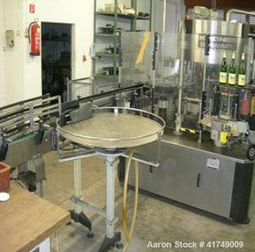 Used Wine Bottling Line, output 3000 bottles / hour, sizes 8 - 33 ounces (0.25 - 1 liter).  Comprised of:  (3) Forms 0.75 liter Bordeaux, 0.25 liter Bocksbeutel, 0.75 liter Bocksbeutel.  (1) Depallet...