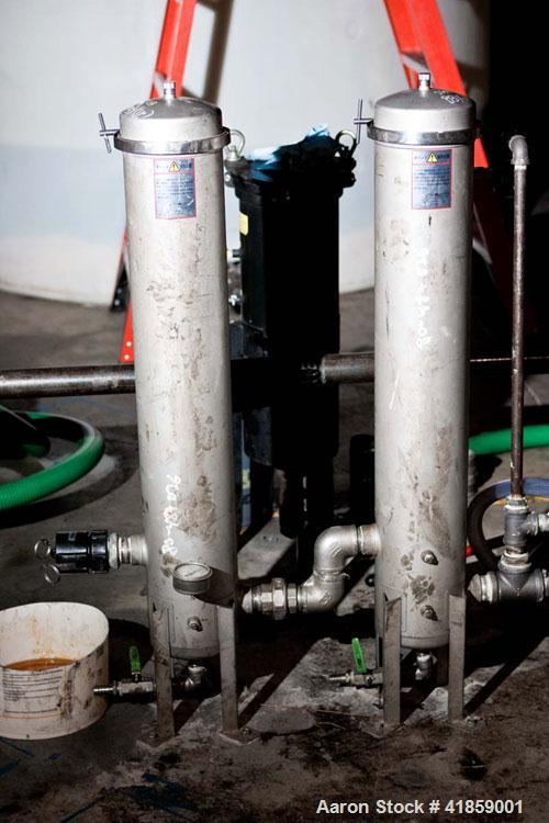 Used Biodiesel Plant, 6,000 gallons per week capacity, includes the following: (4) 9500 gallon poly vertical tanks; 2,000 gallon poly vertical tank; 400 gallon cone bottom tank with stand; 120 gallon...