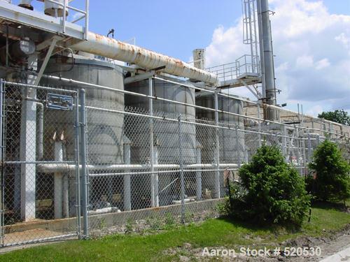 USED: Phillips-Croftshaw solvent recovery system. Rated 10,000 cfm stream of contaminated air and recover 500 lbs/hour of solvents. (3) Absorbers, (1) cooling tower, (1) 26' distillation column and (...