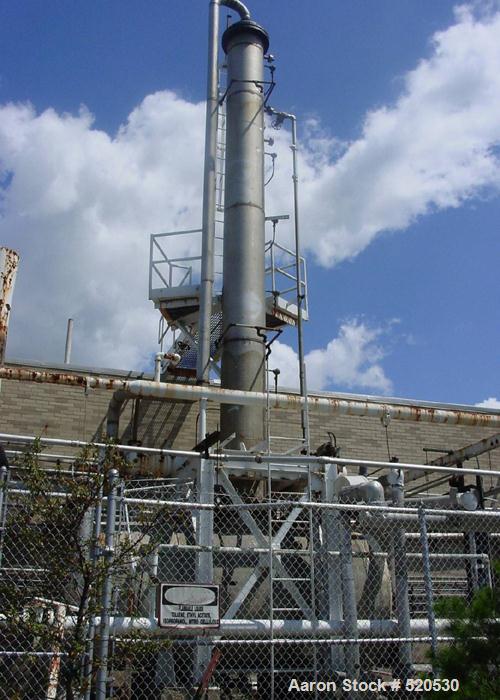 USED: Phillips-Croftshaw solvent recovery system. Rated 10,000 cfm stream of contaminated air and recover 500 lbs/hour of solvents. (3) Absorbers, (1) cooling tower, (1) 26' distillation column and (...