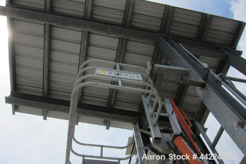 Used SafeRack Truck Loading Rack.  Hatch loading and hose connection hookups.  Piping and loading arms.  XP Opti-Therm self-switching rack monitor.