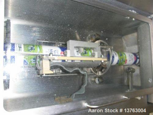 Used Tetra Pak TBA 21 Slim with PT21 Pull-Tab System, aseptic carton filler. Capacity 7,000 units per hour, unit volume 33.8 oz (1 liter). Manuals included. Work hours 29,482.