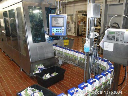 Used Tetra Pak TBA 21 Slim with PT21 Pull-Tab System, aseptic carton filler. Capacity 7,000 units per hour, unit volume 33.8 oz (1 liter). Manuals included. Work hours 29,482.