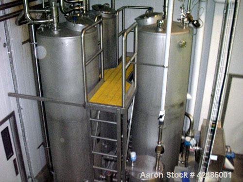 Used Complete Processing Line that fed a TetraPak A3 Flex Filler including:  Tetra Alsafe sterile tank 12,000 liter, apporixmately 3,000 gallon, rated 200 psi, jacketed, on scales, sweep mixer; Tetra...