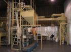 Used Complete Food Grade Extrusion Line, rated 1 ton per hour. Equipment includes: Flexicon hydraulic bulk bag unloader with airlock; single screw 75 hp Conex 5500 extruder; twin screw former that ru...