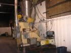 Used Complete Food Grade Extrusion Line, rated 1 ton per hour. Equipment includes: Flexicon hydraulic bulk bag unloader with airlock; single screw 75 hp Conex 5500 extruder; twin screw former that ru...