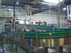 Used Can Filling Line for slim-line cans type 200/202, 150/250 ml.  Capacity 600 cans per minute.  Comprised of:  (1) Kettner depalletizer, (1) Vroemisse can conveyor, (1) Vroemisse rinser, (1) KHS H...