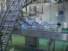 Used Can Filling Line for slim-line cans type 200/202, 150/250 ml.  Capacity 600 cans per minute.  Comprised of:  (1) Kettner depalletizer, (1) Vroemisse can conveyor, (1) Vroemisse rinser, (1) KHS H...