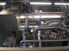 Used Can Filling Line for slim-line cans type 200/202, 150/250 ml.  Capacity 600 cans per minute.  Comprised of:  (1) Kettner depalletizer, (1) Vroemisse can conveyor, (1) Vroemisse rinser, (1) KHS H...