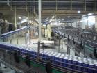 Used Can Filling Line for slim-line cans type 200/202, 150/250 ml.  Capacity 600 cans per minute.  Comprised of:  (1) Kettner depalletizer, (1) Vroemisse can conveyor, (1) Vroemisse rinser, (1) KHS H...
